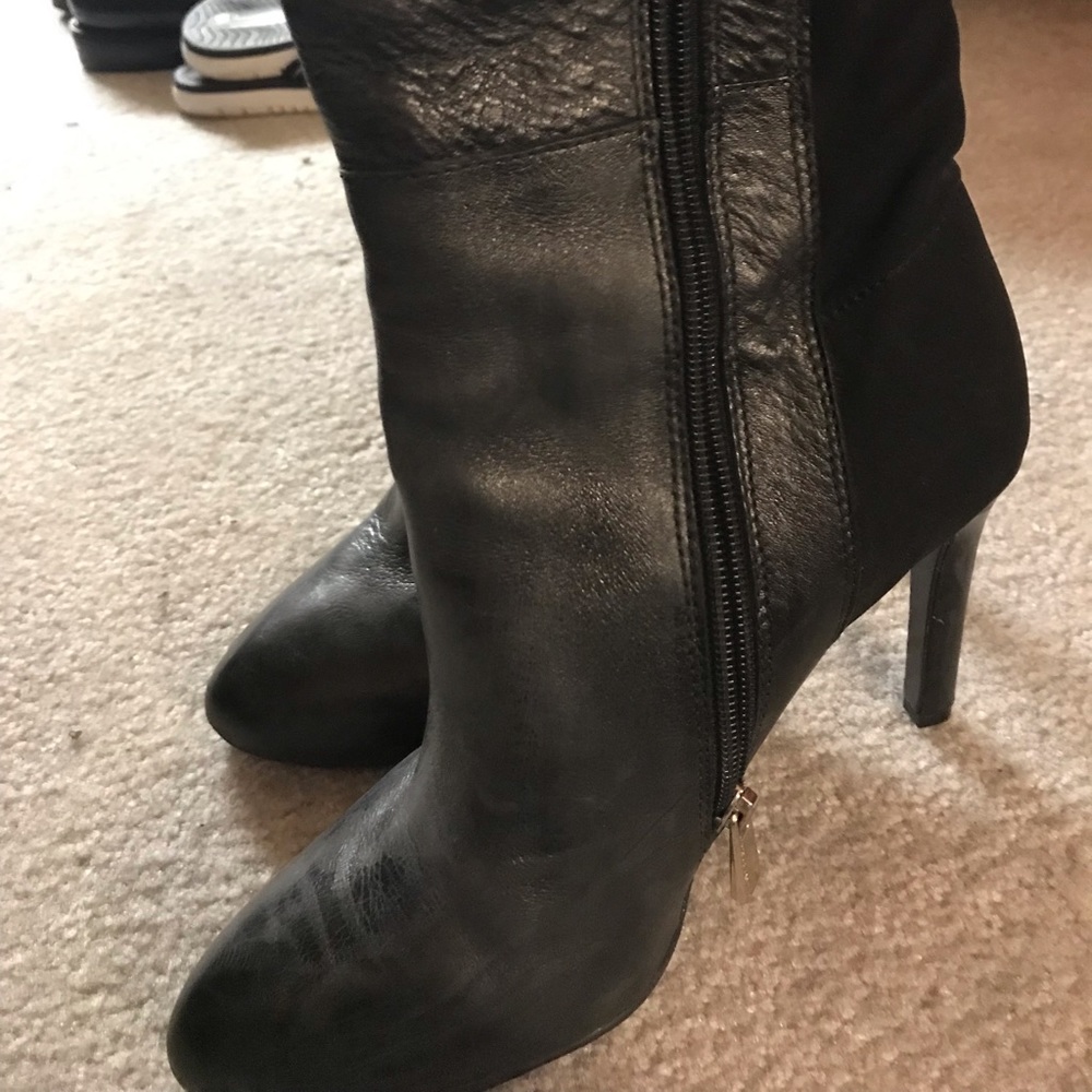 Black heel boots. Stretchy back. Size 7.5
